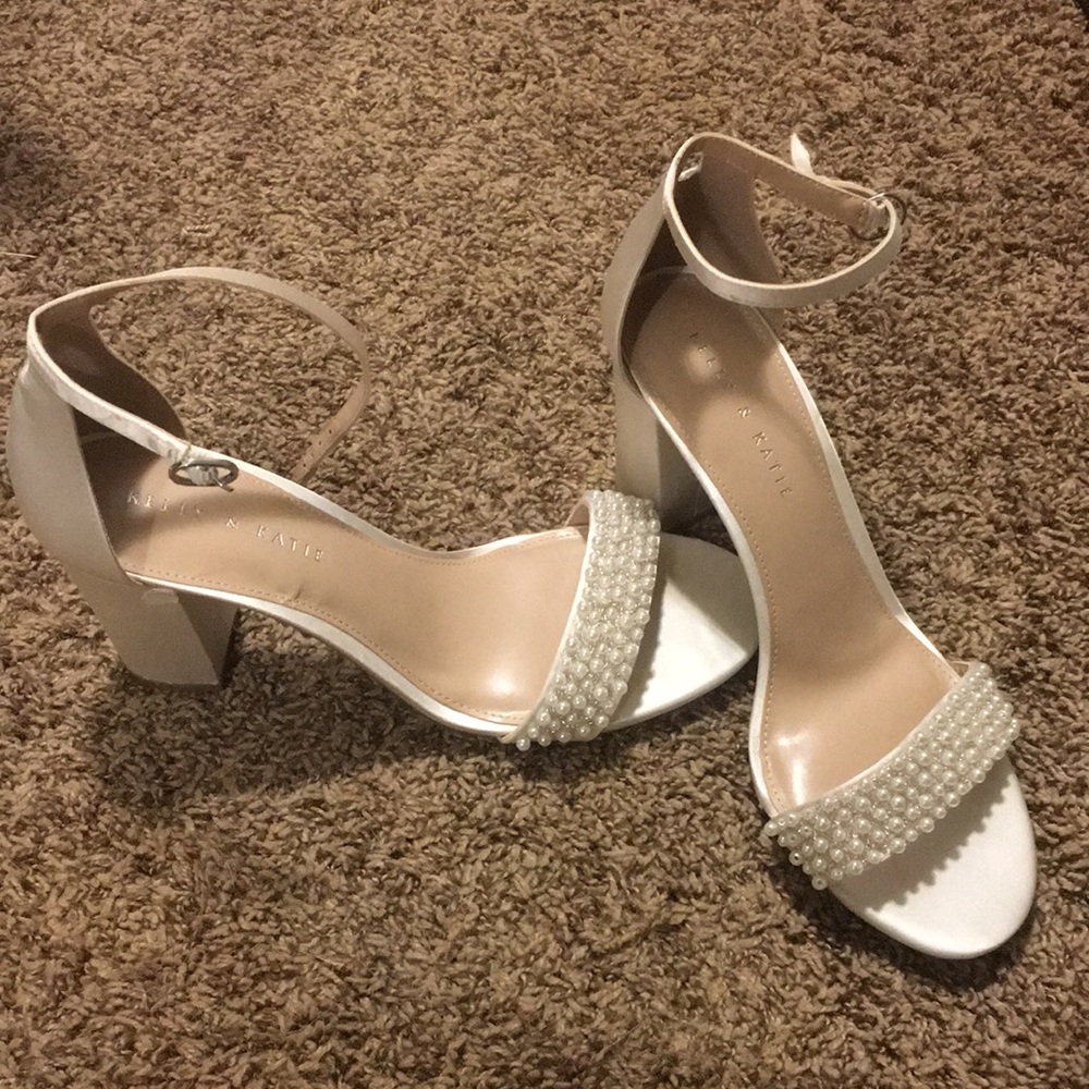 Kelly & Katie, size 10 white heels.